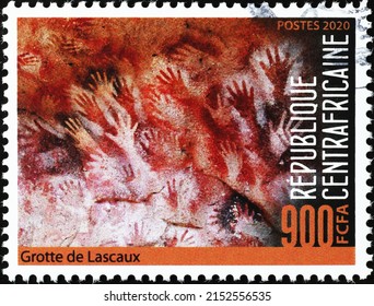 Milan, Italy - April 21, 2022: Prehistoric depictions of hands from Lascaux caves on stamp