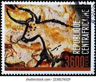 Milan, Italy - April 21, 2022: Prehistoric depictions of ox from Lascaux caves on stamp