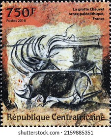 Milan, Italy - April 21, 2022: Prehistoric depictions of rhinos on postage stamp