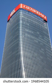 Milan, Italy - April 25, 2021. CityLife Shopping District Glass Buildings In A Hot Spring Day. Three Skyscrapers: The Straight One, The Twisted One, The Curved On After COVID-19 Lockdown