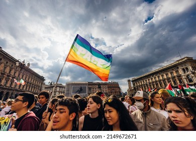 MILAN, ITALY - APRIL 25 2022: Peace Flag Waving The In Milan At Celebratio Of Anniversary Of The Liberation Of Italy From Nazism And Fascism Claiming For World Peace