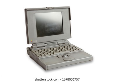 Milan, Italy - April 8, 2020: Close Up On A Vintage Apple Computer, The Power Mac180c, Resting On White Background With Clipping Path.