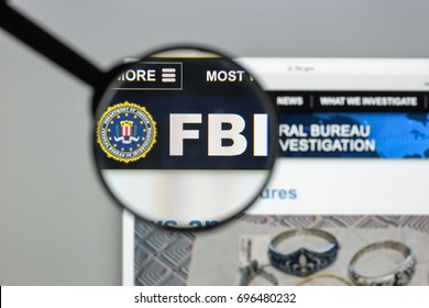 Milan, Italy - August 10, 2017: Fbi website homepage. It is the domestic intelligence and security service of the United States, and its principal federal law agency. FBI logo visible.