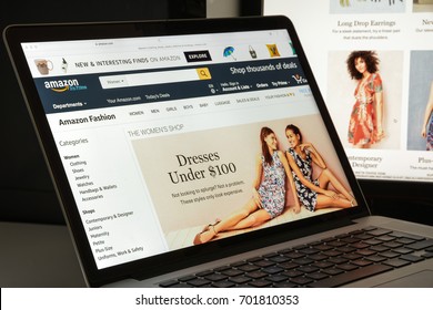 Milan, Italy - August 10, 2017: Amazon website homepage. It is an American electronic commerce and cloud computing company. Amazon.com logo visible.
