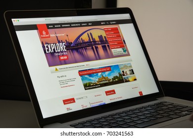 Milan, Italy - August 10, 2017: Emirates flights website homepage. It is an airline based in Dubai, United Arab Emirates. Emirates air lines logo visible.