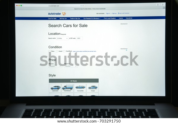 Milan, Italy - August\
10, 2017: Autotrader website homepage. It an American automobile\
sales website and originator of the Auto Trader format. Autotrader\
logo visible.