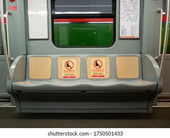 Milan, Italy - Circa June 2020: Stickers On Subway Seats Indicate Correct Behavior Against The Spread Of Coronavirus Covid-19