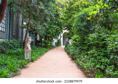 Milan, Italy - Circa June 2021: Italian Villa Entrance With Garden. Luxurious Green Exterior