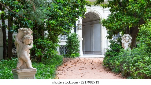 Milan, Italy - Circa June 2021: Italian Villa Entrance With Garden. Luxurious Green Exterior