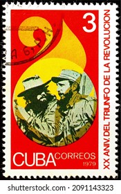 Milan, Italy, December 14, 2021: postage stamp from the 20th anniversary of the revolution series, printed in Cuba in 1979 showing Fidel Castro and a soldier.