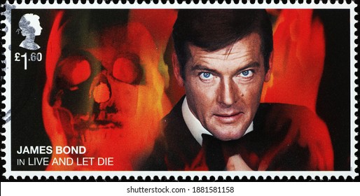 Milan, Italy - December 18, 2020: Roger Moore as James Bond on british postage stamp