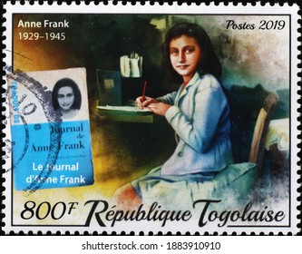 Milan, Italy - December 18, 2020: Anne Frank Portrait On Stamp Of Togo