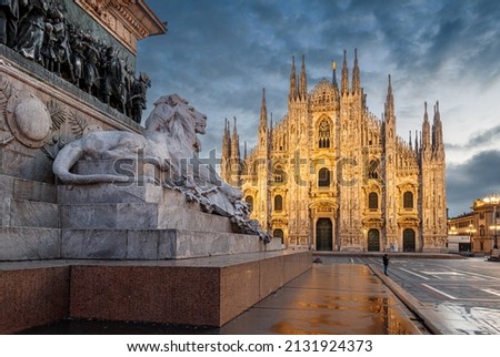 Milan, Italy at the Milan Duomo and Statua di Vittorio Emanuele II at twilight.
