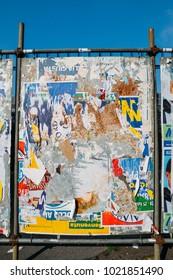 Milan, Italy - Feb 10, 2018: Ripped Up Billboards Ahead Of  2018 Italian General Election Is Due To Be Held On March 4th, 2018