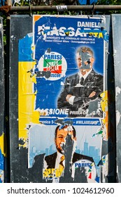 Milan, Italy - Feb 13, 2018: Ripped Up Defaced Billboards Ahead Of 2018 Italian General Election Is Due To Be Held On March 4th, 2018