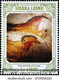 Milan, Italy  - February 02, 2021: Horses in cave paintings of Lascaux on postage stamp