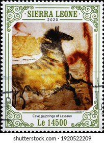 Milan, Italy  - February 02, 2021: Horse in cave paintings of Lascaux on postage stamp