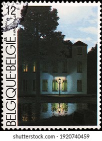 Milan, Italy  - February 04, 2021: The Empire Of Light By René Magritte On Postage Stamp