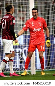 MILAN, ITALY - February 13, 2020: 
Zlatan Ibrahimovic And Gianluigi Buffon Share A Joke During The Coppa Italia 2019/2020 MILAN V JUVENTUS At San Siro Stadium. 