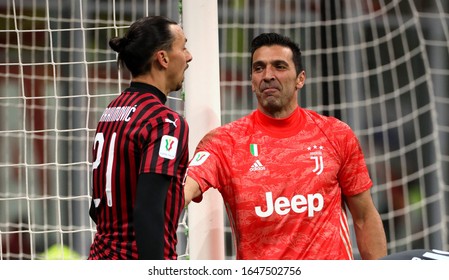 MILAN, ITALY - February 13, 2020: 
Zlatan Ibrahimovic And Gianluigi Buffon Share A Joke During The Coppa Italia 2019/2020 MILAN V JUVENTUS At San Siro Stadium. 