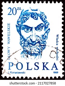 Milan, Italy, February 2, 2022: stamp printed in Poland in 1989 from the series Carved Wawel heads. The stamp shows Eastern Ruler. Topics: Art | Sculptures.