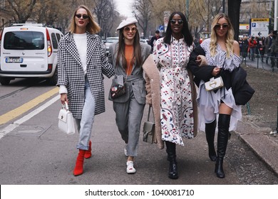 Milan, Italy - February 21, 2018: Models, bloggers and influencers with fashionable and stylish looking during Milan Fashion Week.
