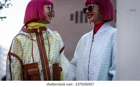 MILAN, Italy- February 21 2019: Ami Suzuki And Aya Suzuki On The Street During The Milan Fashion Week.