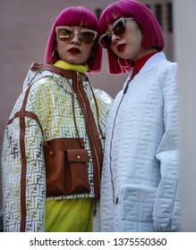 MILAN, Italy- February 21 2019: Ami Suzuki And Aya Suzuki On The Street During The Milan Fashion Week.