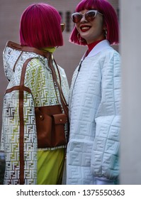 MILAN, Italy- February 21 2019: Ami Suzuki And Aya Suzuki On The Street During The Milan Fashion Week.