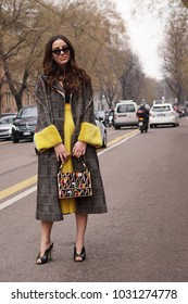 Milan, Italy - February 22, 2018: Girl With Fashionable Outfit Posing After Fendi Show During Milan Fashion Week.