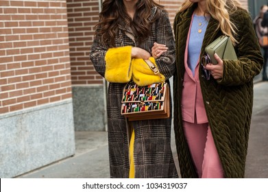 MILAN, ITALY - FEBRUARY 22, 2018: Stylish person posing  outside FENDI during Milan Fashion Week Fall/Winter 2018/19 on February 22, 2018 in Milan, Italy - street style elements
