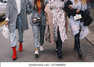 Milan, Italy - February 24, 2018: Extravagant outfit of a influencer outside a fashion show, posing during Milan Fashion Week.