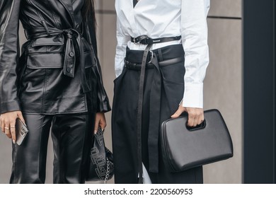 Milan, Italy - February, 24: Street Style, Woman Wearing White V-neck Shirt And Black Leather Pants.