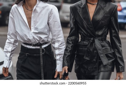 Milan, Italy - February, 24: Street Style, Woman Wearing White V-neck Shirt And Black Leather Pants.