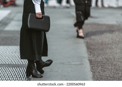 Milan, Italy - February, 24: Street Style, Woman Wearing White V-neck Shirt And Black Leather Pants.