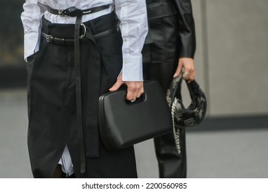 Milan, Italy - February, 24: Street Style, Woman Wearing White V-neck Shirt And Black Leather Pants.