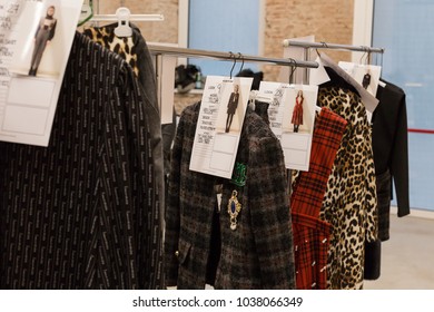 MILAN, ITALY - FEBRUARY 25: Clothes Rack In The Backstage Just Before Au Jour Le Jour Show During Milan Women's Fashion Week On FEBRUARY 25, 2018 In Milan.