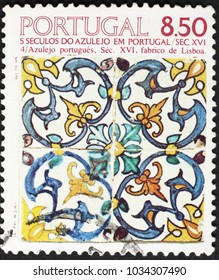 Milan, Italy - January 10, 2018: Traditional handpainted tiles on portuguese postage stamp
