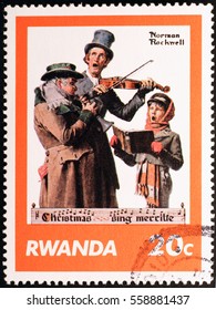 Milan, Italy - January 13, 2017: Christmas Singers By Norman Rockwell On Postage Stamp