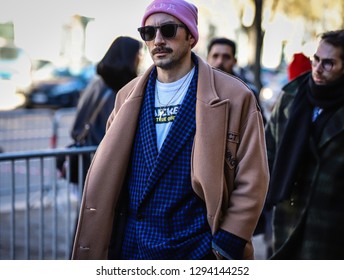 MILAN, Italy- January 14 2019: Men on the street during the Milan Fashion Week.