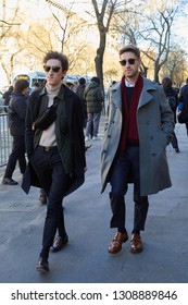 MILAN, ITALY - JANUARY 14, 2019: Men Walking Before Fendi Fashion Show, Milan Fashion Week Street Style 