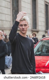 MILAN, ITALY - JANUARY 20: Model Lucky Blue Smith poses outside Cavalli fashion show building for Milan Men's Fashion Week on JANUARY 20, 2015 in Milan.