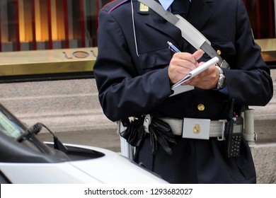 Milan , Italy January 24, 2018 Traffic Cops Fined A Parked Car - Police Make Penalties For Infraction Of The Highway Code