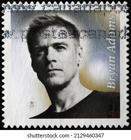 Milan, Italy - January 24, 2022: Bryan Adams portrait on canadian stamp