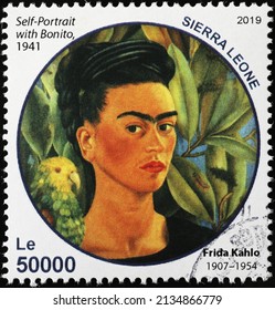 Milan, Italy - January 24, 2022: Self Portrait With Parakeet By Frida Kahlo On Postage Stamp