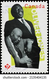 Milan, Italy - January 24, 2022: Oliver Jones portrait on canadian postage stamp
