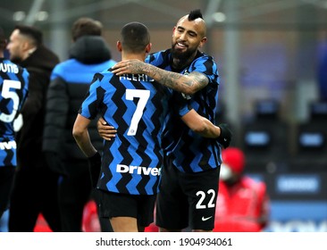 MILAN, ITALY - January 26, 2021: 
Arturo Vidal celebrates the victory with Alexis Sanchez during the Coppa Italia 2020-2021 INTER v MILAN at San Siro Stadium. 
