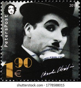 Milan, Italy - July 17, 2020: Intense portrait of Charlot on postage stamp