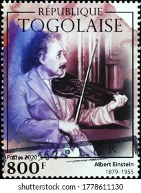 Milan, Italy - July 17, 2020: Albert Einstein Playing The Violin On Postage Stamp