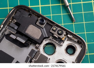 Milan, Italy - July 2, 2022: Apple IPhone 13 Pro Max Face ID With Dot Projector And Infrared Senso And Selfie Camera On Top Of The Frame, Teardown IPhone